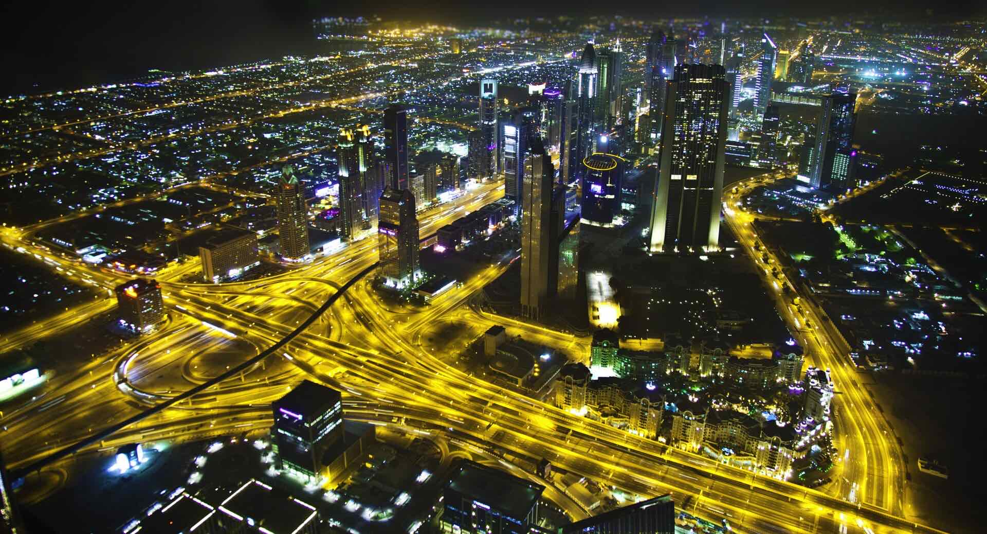 Dubai business district at night seen from Burj Khalifa